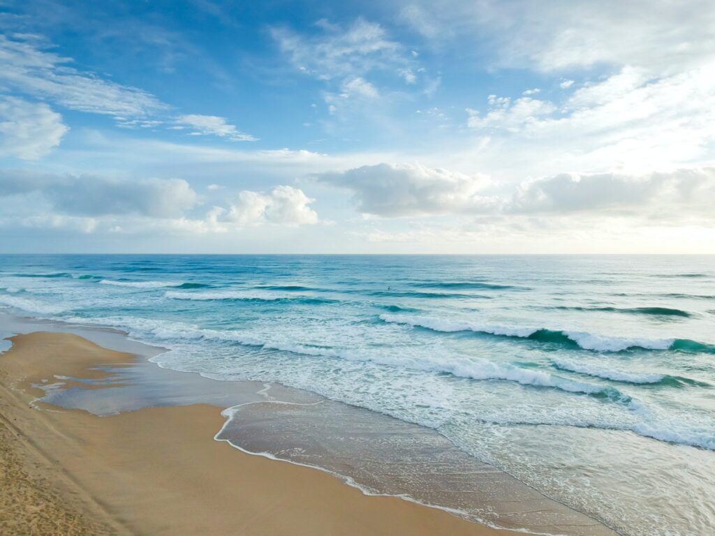 Photo by Daniel  Jurin: https://www.pexels.com/photo/beach-under-blue-and-white-sky-1835718/