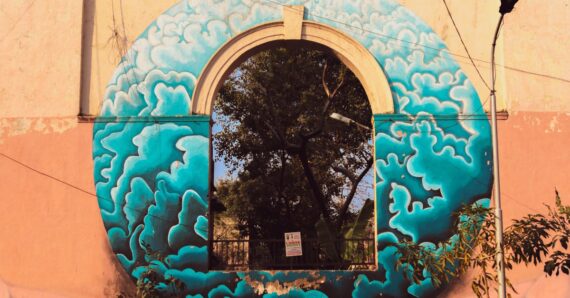 arched window with mural