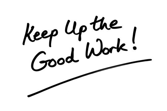 An image of coursive writing on a white paper saying Keep Up the Good Work!