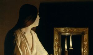 Portrait of woman with head turned towards candle and mirror