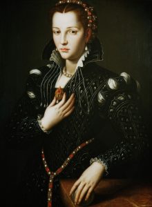 Portrait of beautiful young woman in regal 16th Century costume