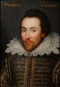 Portrait of rosy-faced Shakespeare in elaborate doublet and high lace collar.