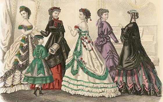 Five ladies and one girl in frilly 19th Century clothing, posed in a drawing room.