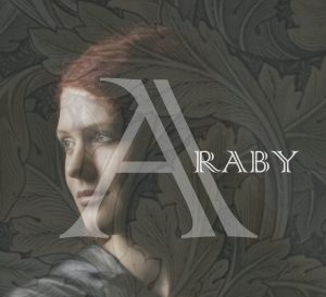 Face of red-haired girl with word "Araby" superimposed