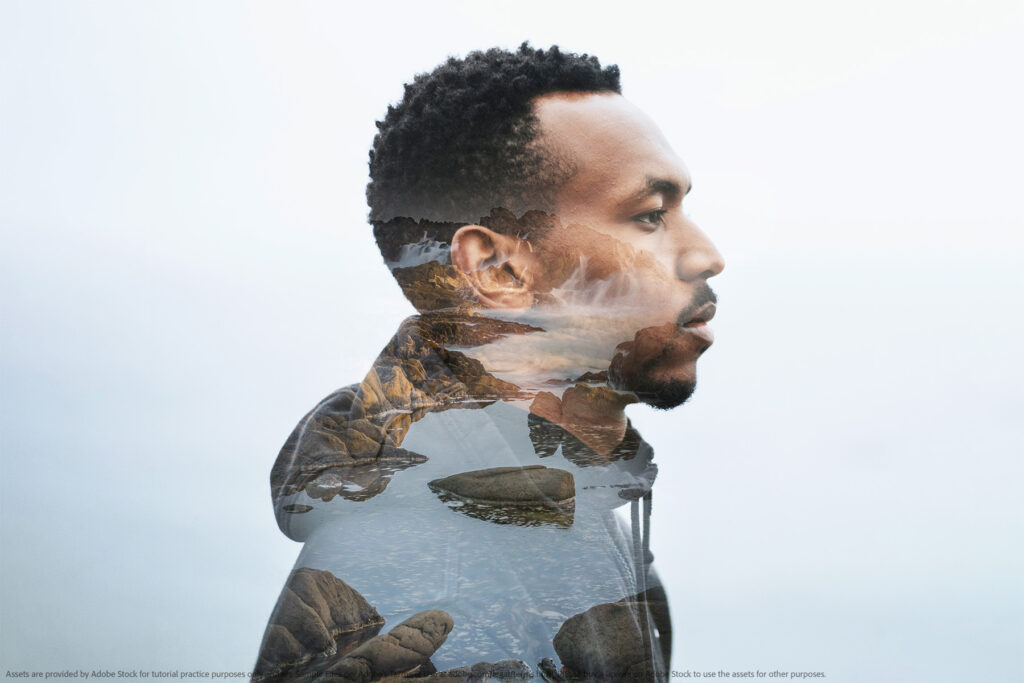 double exposure of a man with a coastline visible inside his silouette