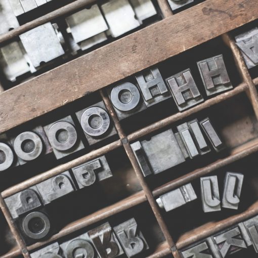 picture of letters for printing press with oooooh spelled